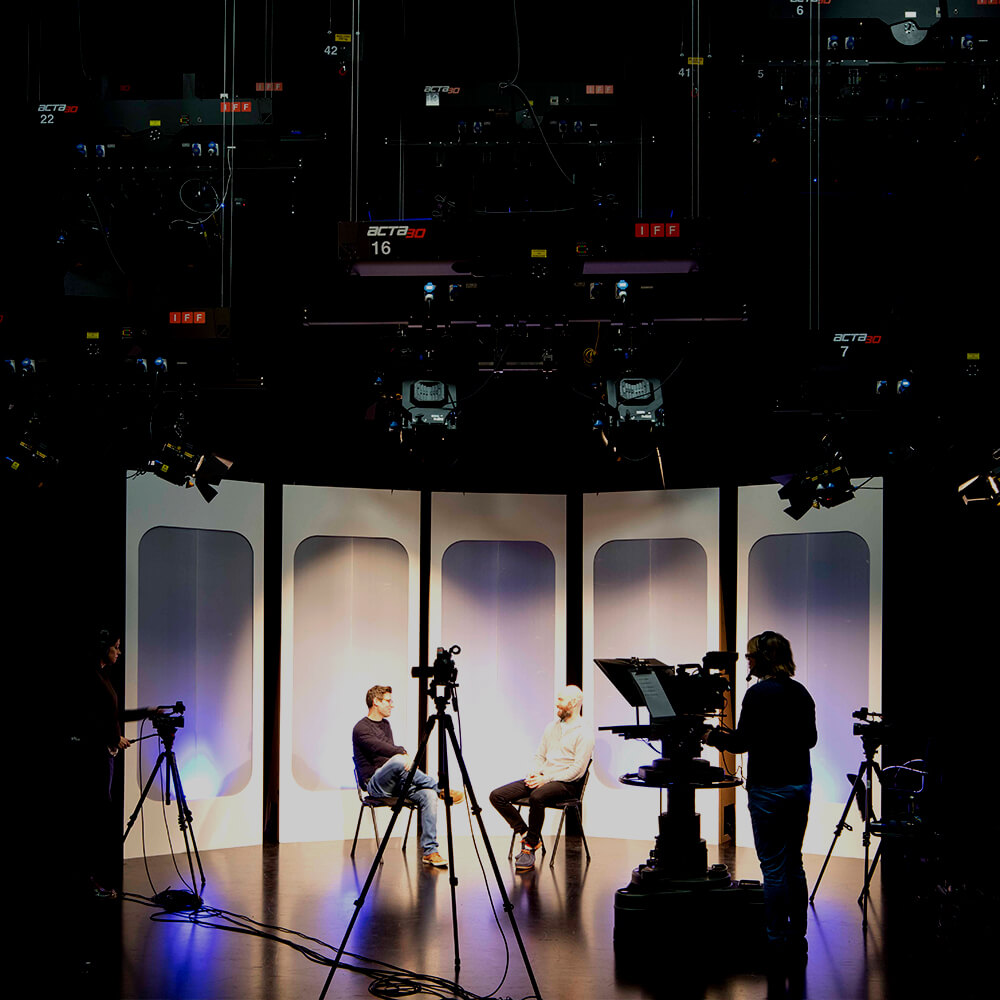 Students filming in the TV studio