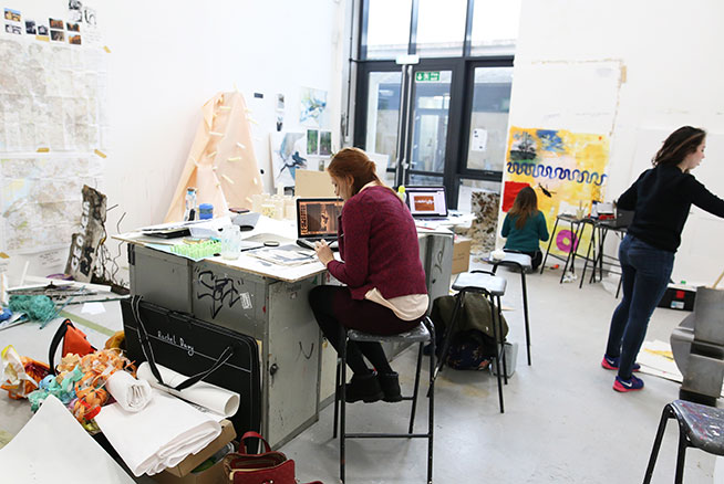 Students working in an art studio