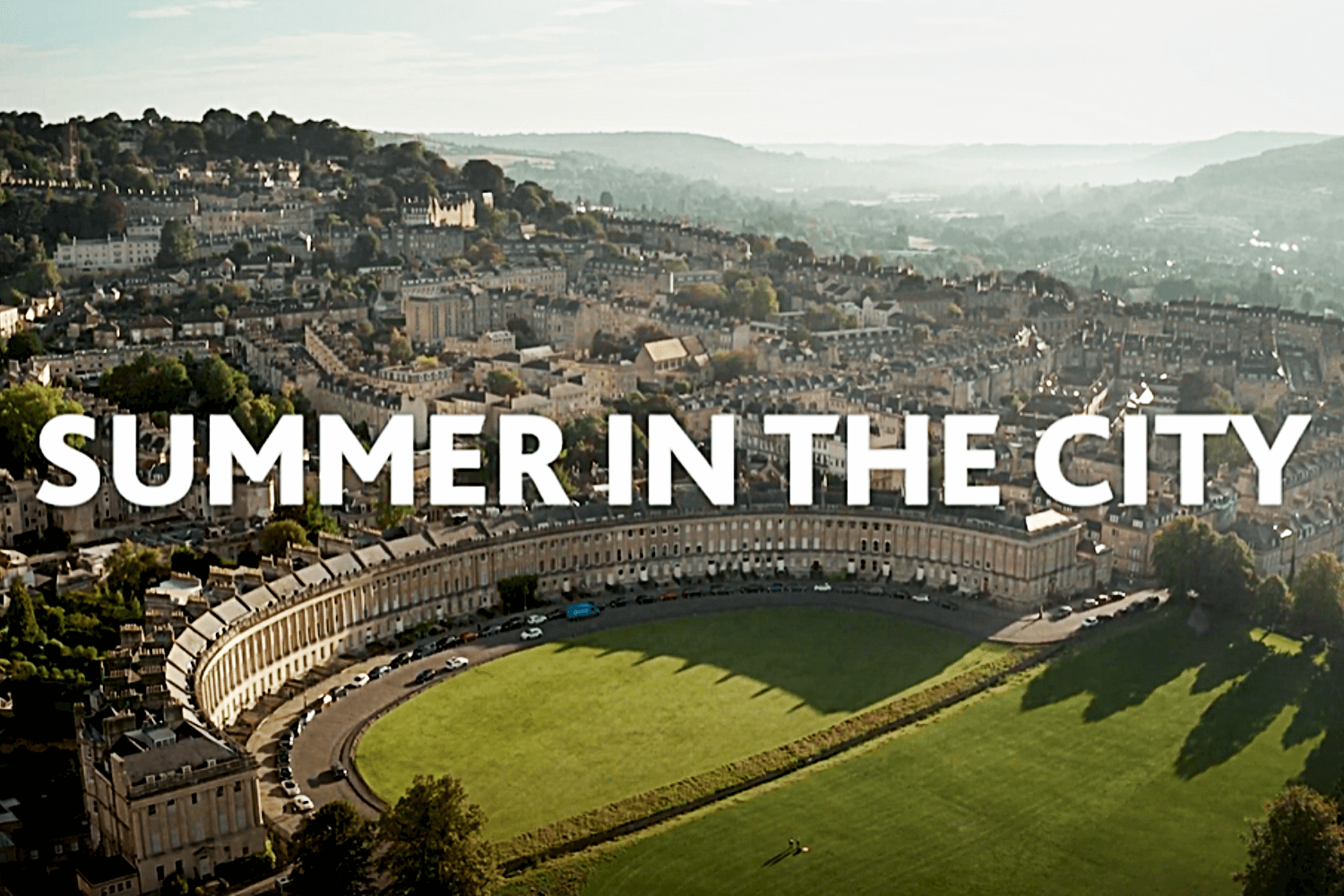 A wide shot of Bath, with the words 'Summer in the city' overlaid on top.