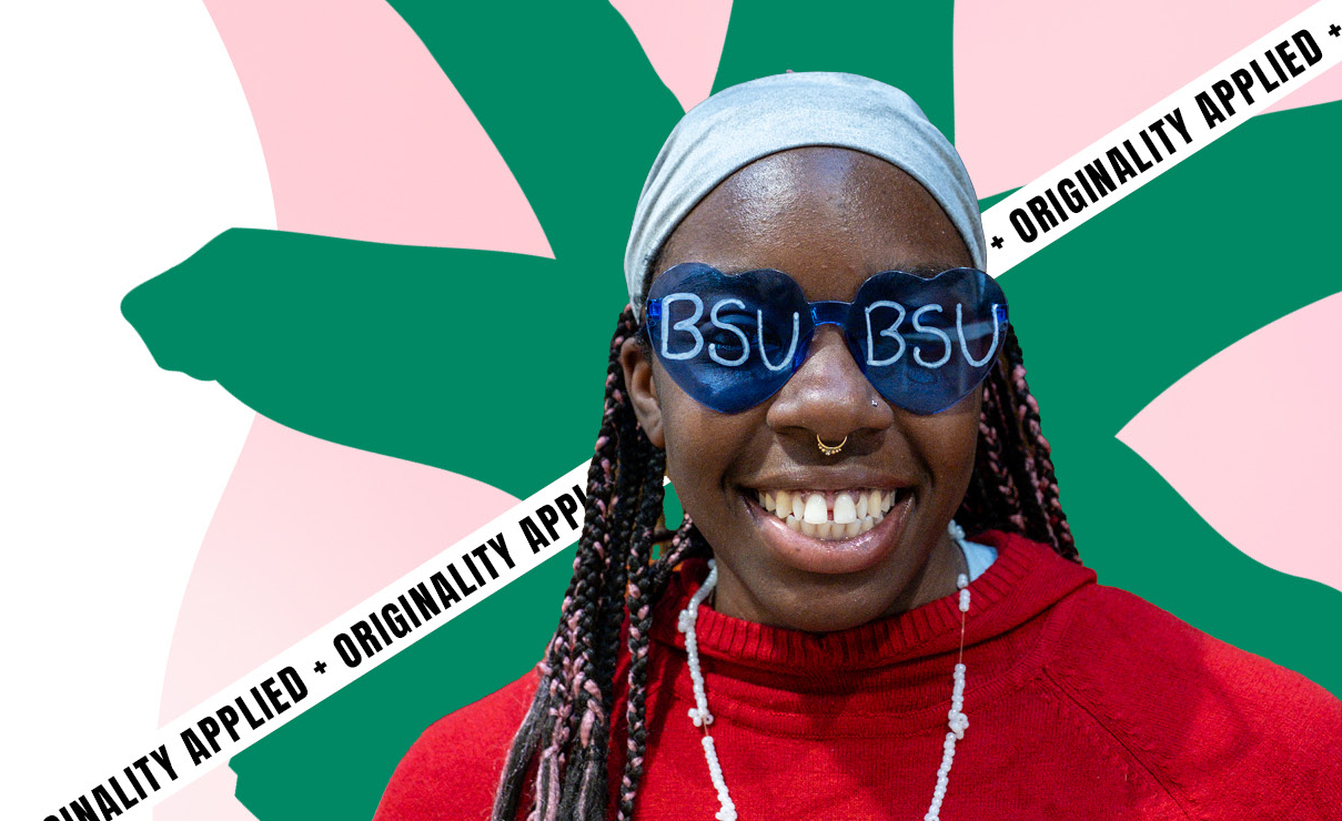 A student wearing BSU glasses, with an 'Originality Applied' banner behind their head
