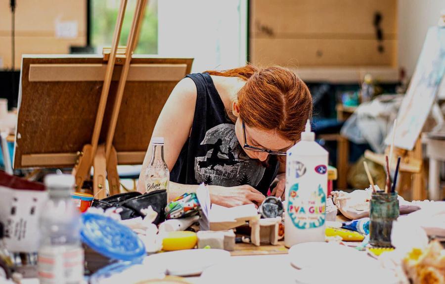 A student works on an art project in one of the spaces at Locksbrook Campus