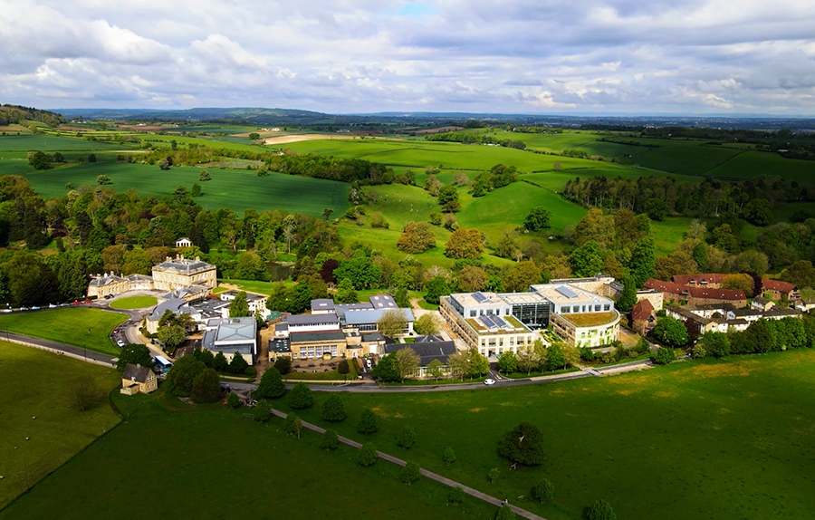 Aerial view of Newton Park campus buildings and green fields