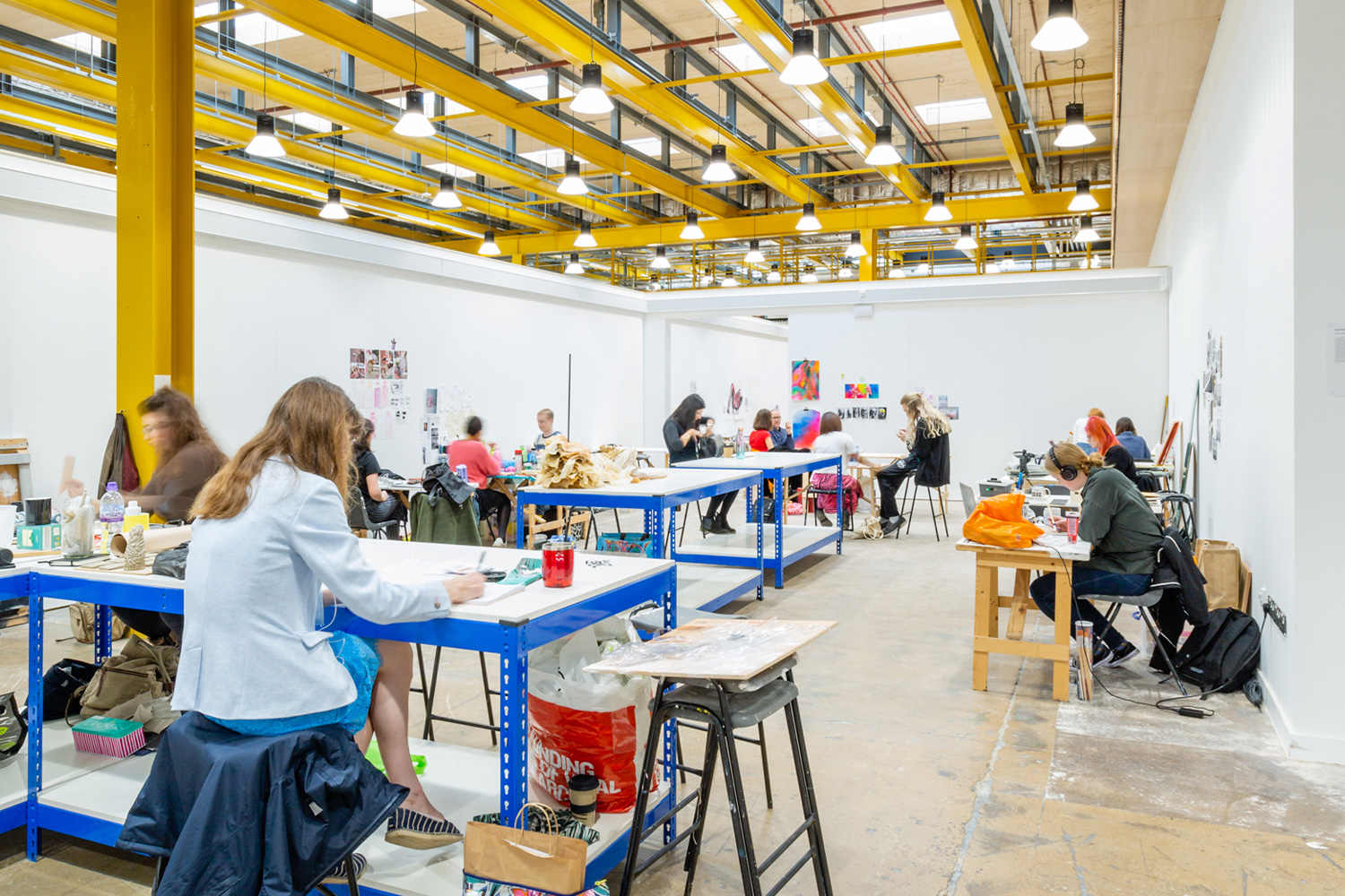 A number of students working in a creative room in Locksbrook