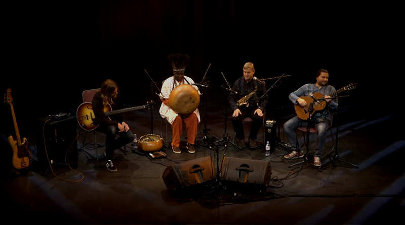 Chartwell on stage with other musicians