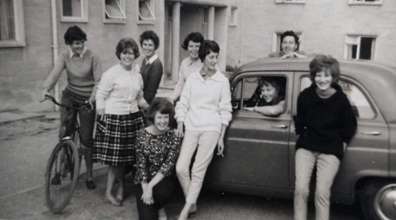 Black and white photo of a group of students outside Sidney Hall, Newton Park