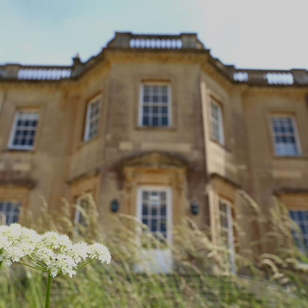 Main house with spring flowers