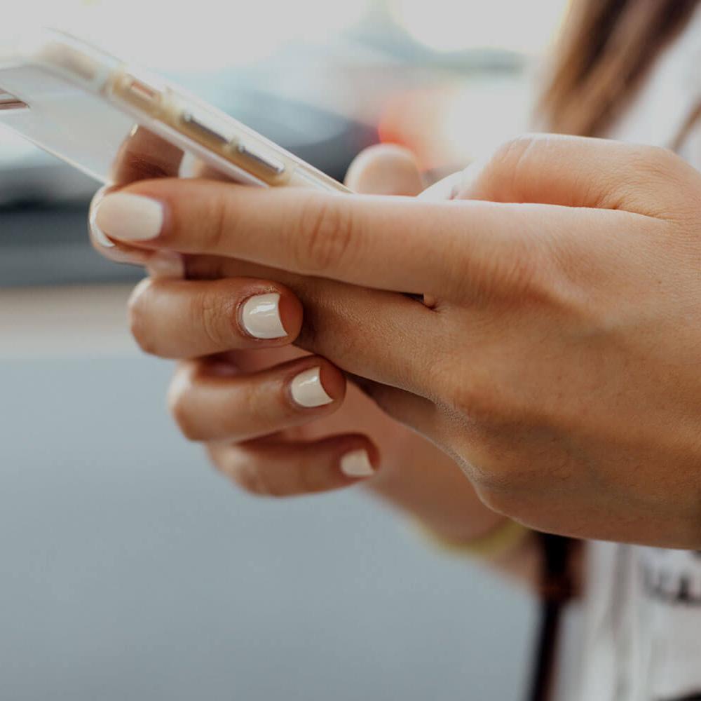 Someone using a mobile phone