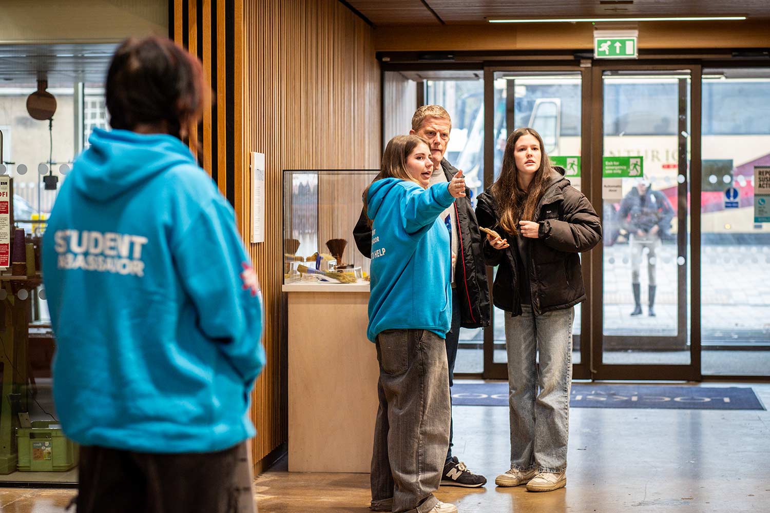 Locksbrook Open Day with ambassadors giving directions to student and parent