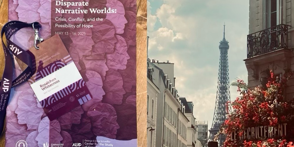 A photo of two booklets lying on a desk. One is the conference programme and the other is an image of the Eiffel Tower.