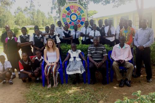 Group of people with Holly: teachers and students