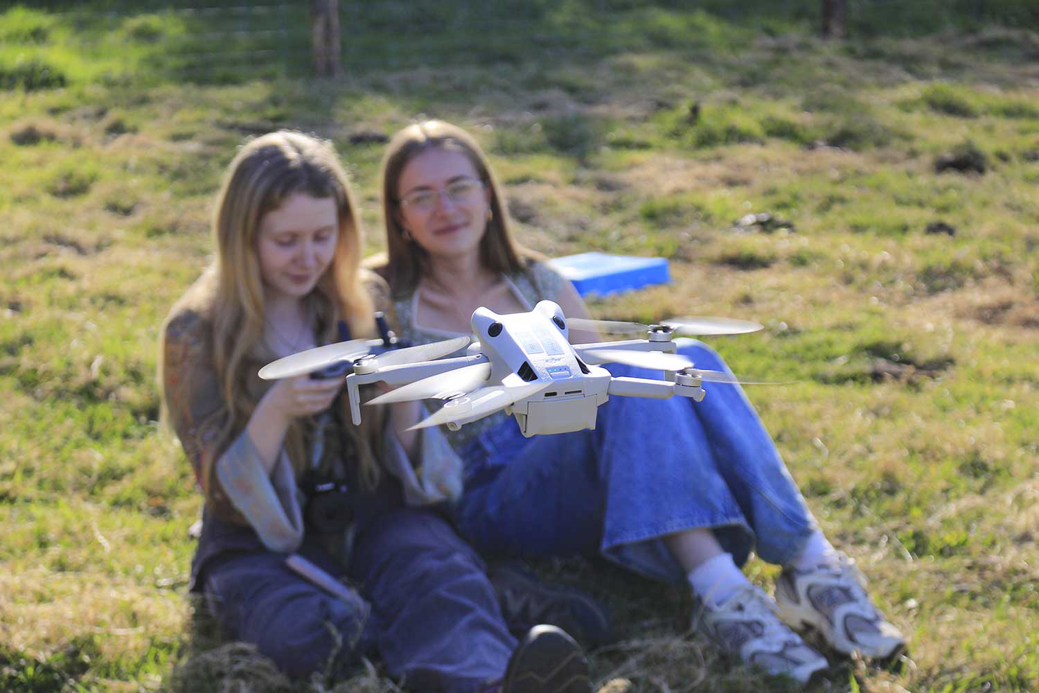 Students flying the drone for aerial photography
