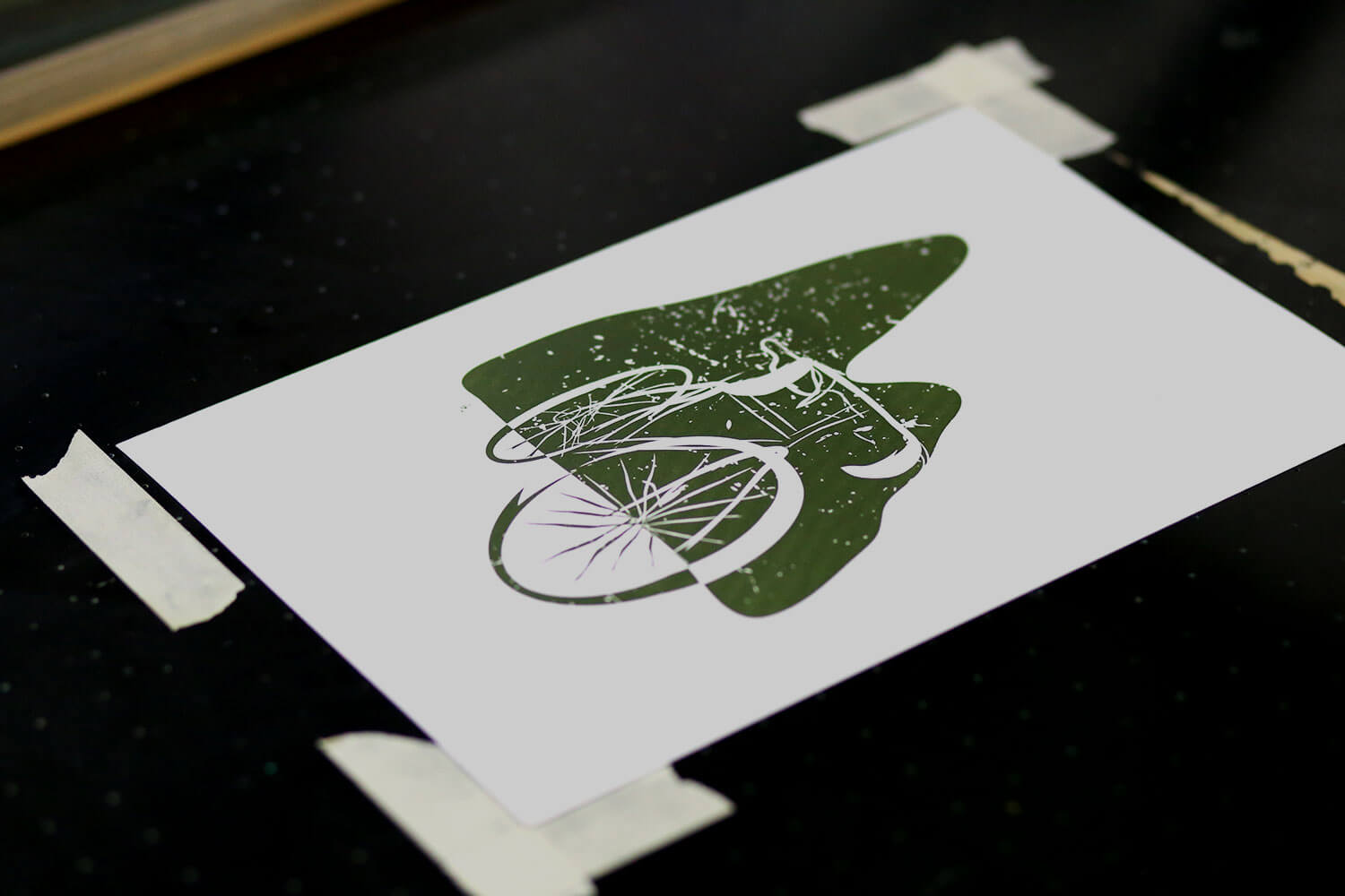 Litho print of bike in green ink