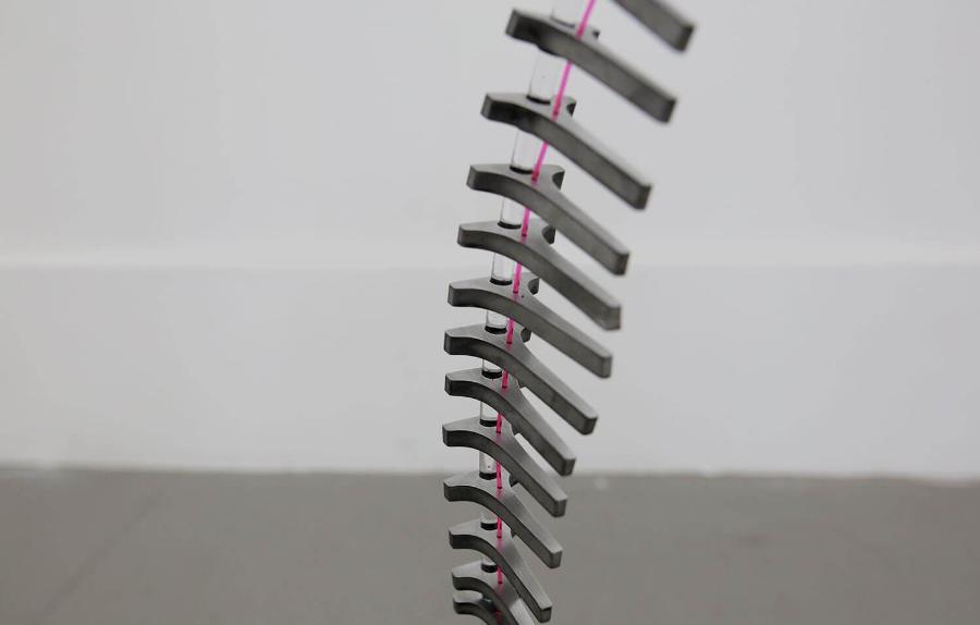 Metalwork designed to resemble a spine