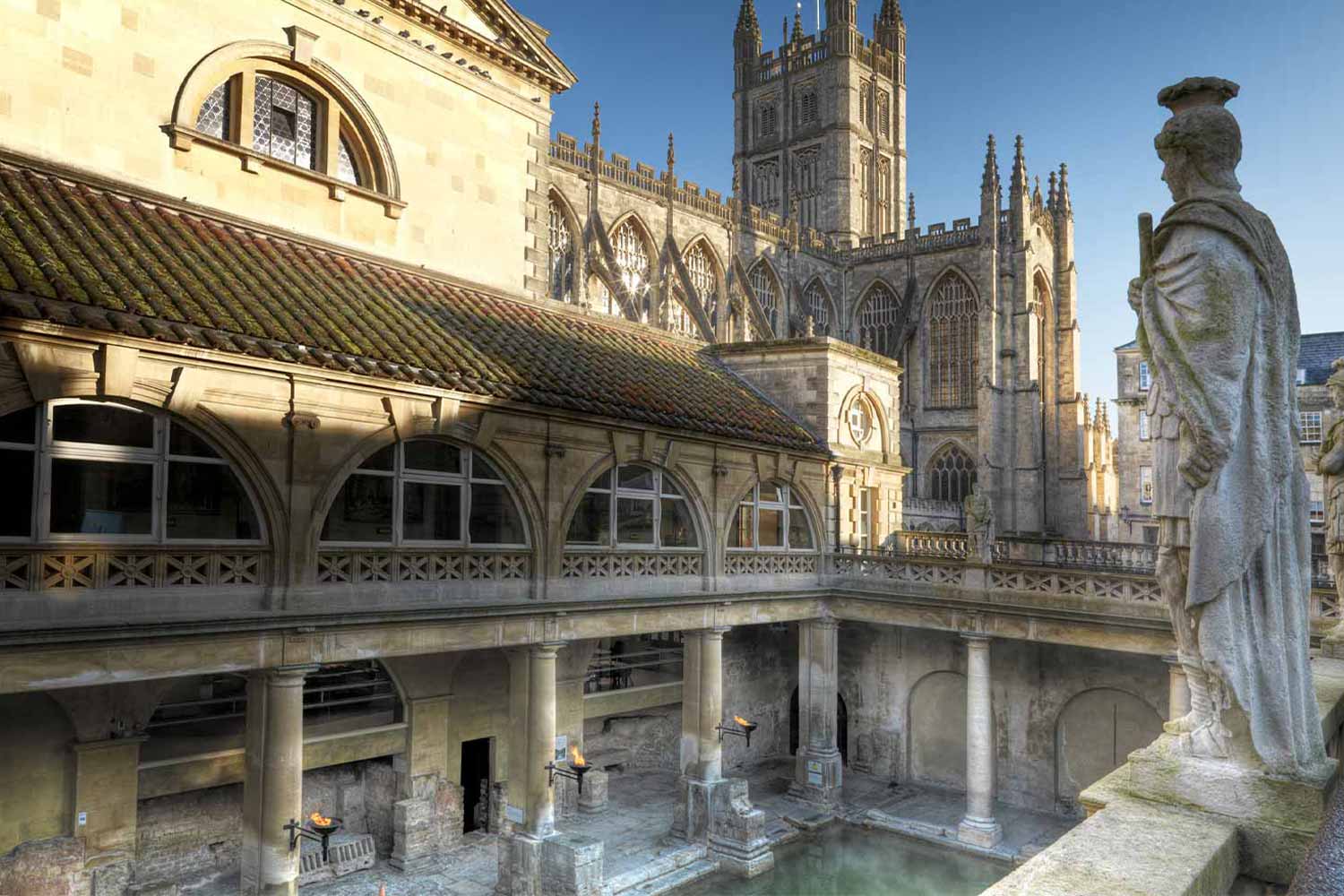 Photograph of Roman baths with Bath Abbey in background