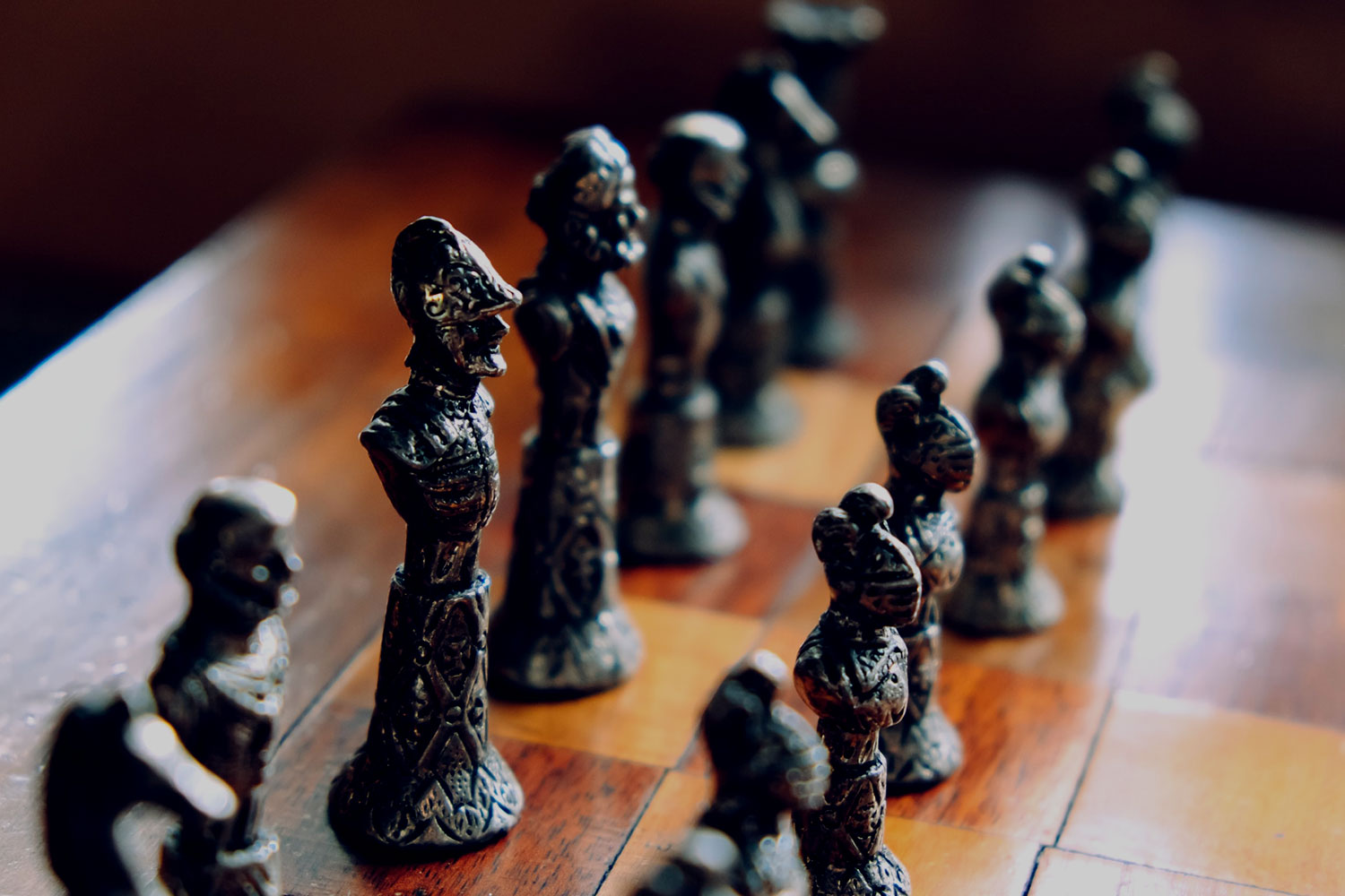 A close up of chess pieces on a board