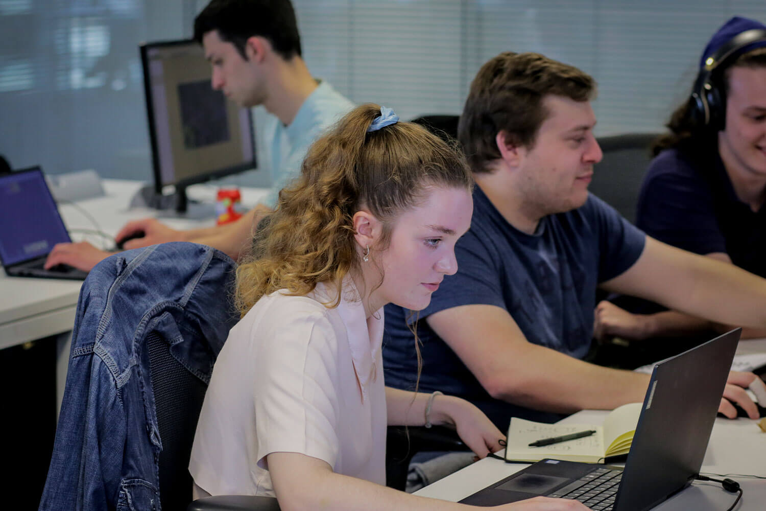 Students working together in a computer lab