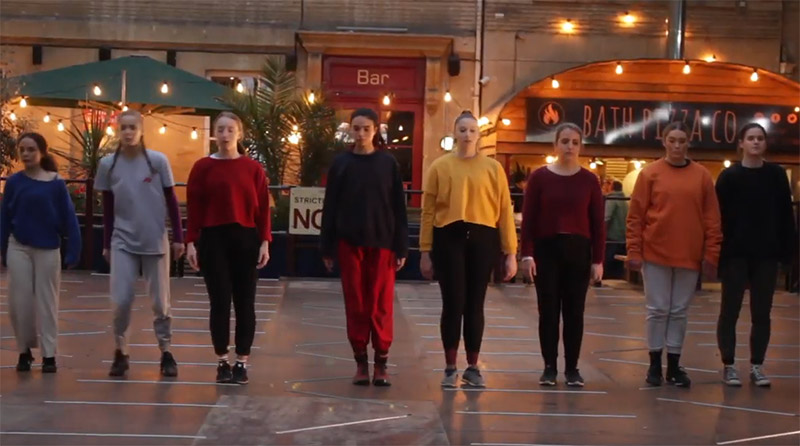 Dancers standing in a line