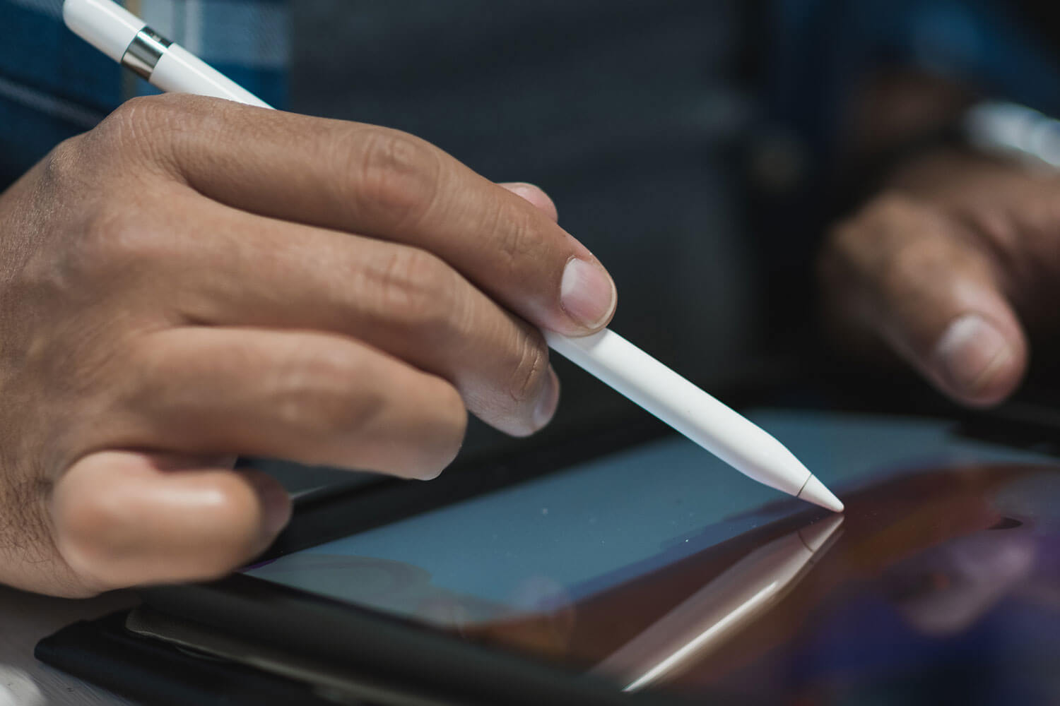 Graphic designer working on an illustration tablet