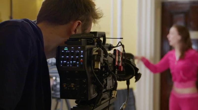 Someone behind a studio camera