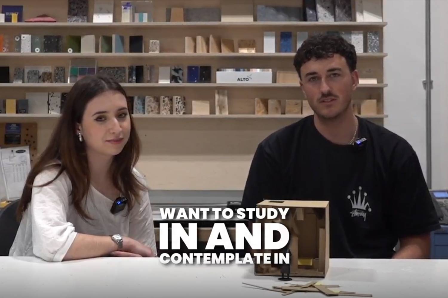 Image of two young people in a creative lab with text