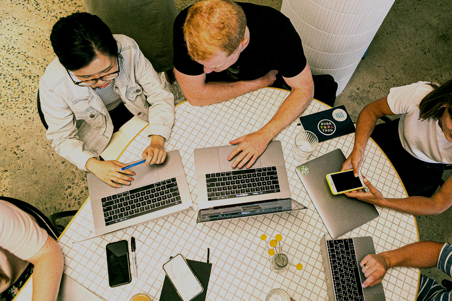 Students working around a table