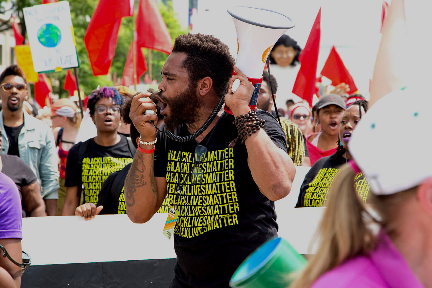 Man shouts into microphone at Black Lives Matter protest