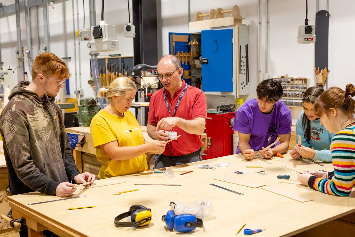 Students take part in a woodwork workshop