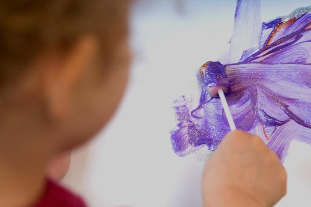Young child painting