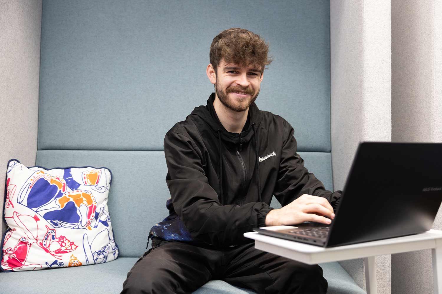 person-at-a-laptop-in-the-library