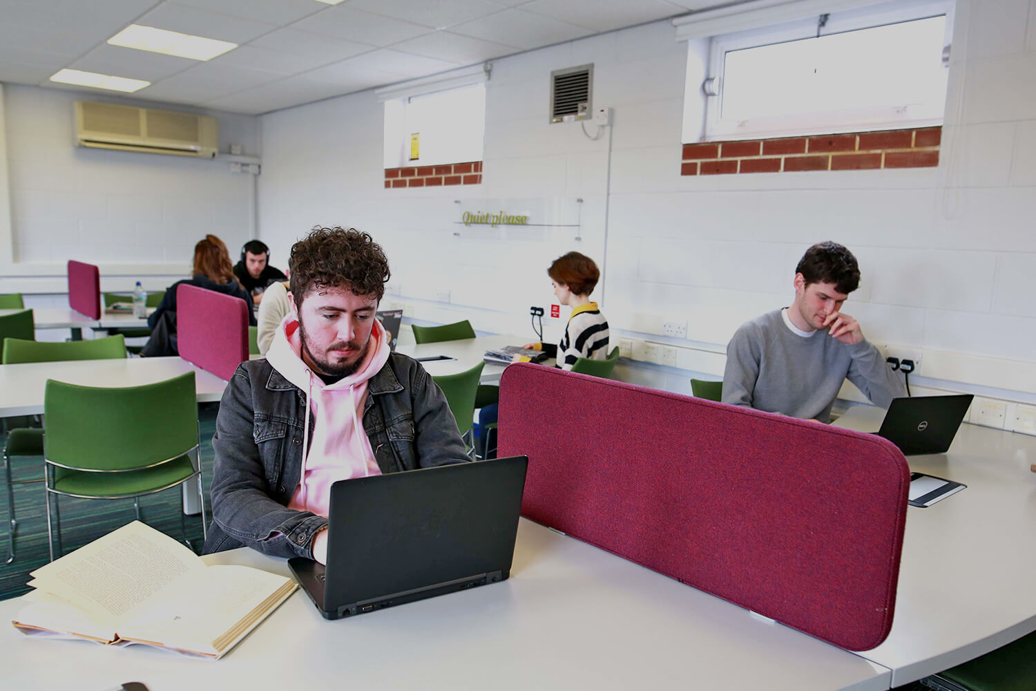 Students studying in the library.