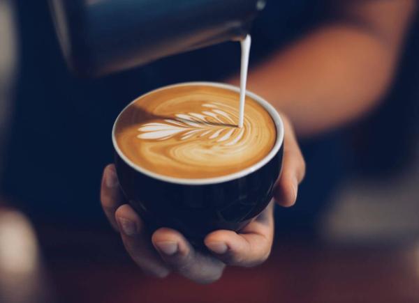 A coffee with latte art on top
