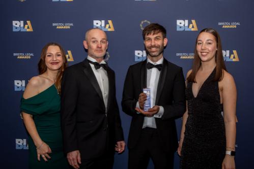 BSU colleagues posing with their Pro Bono of the Year Award