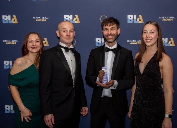 BSU colleagues pose with their Pro Bono of the Year award