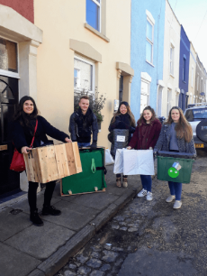 Bath Spa students moving in carrying boxes