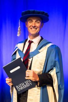 Christopher Crowther with his honorary doctorate