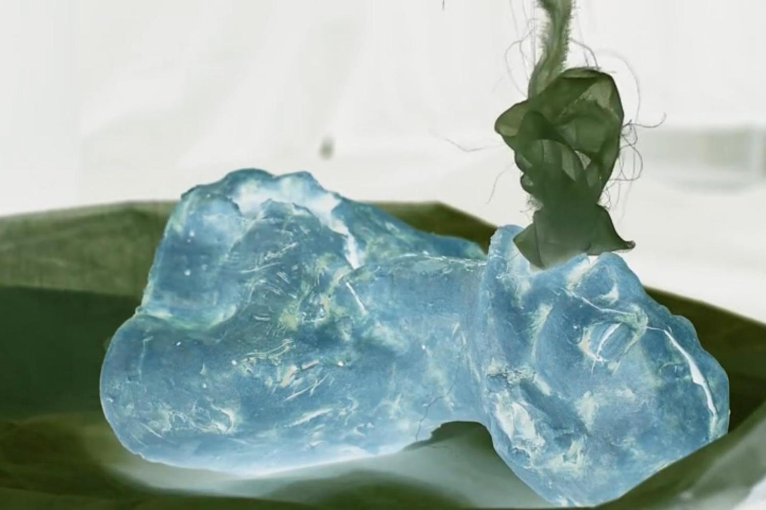 A close up of a blue sculpture