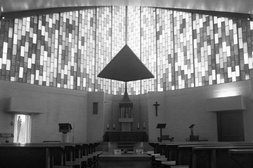Black and white interior shot of a church