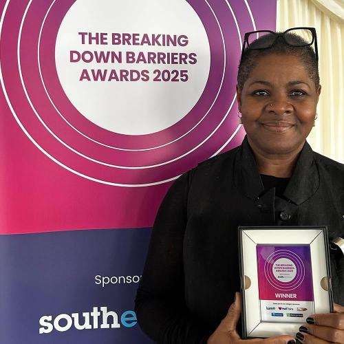 Dr Sharon Colilles with her award