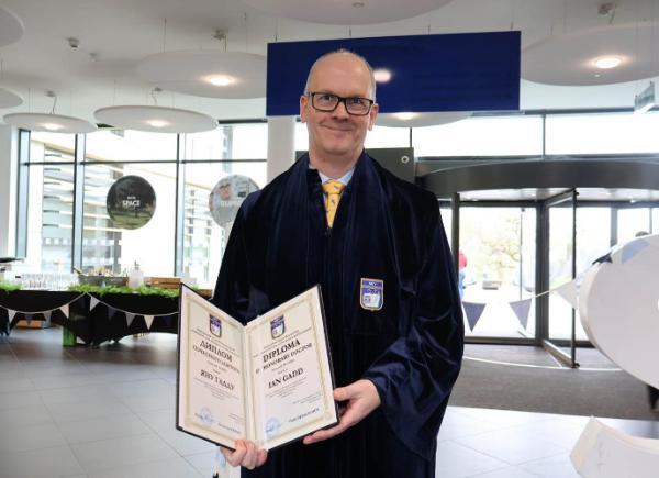 Ian Gadd posing with his honorary degree