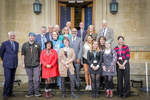 The Lord Lieutenant of Somerset poses with Bath Spa students and staff on the front steps of Main House