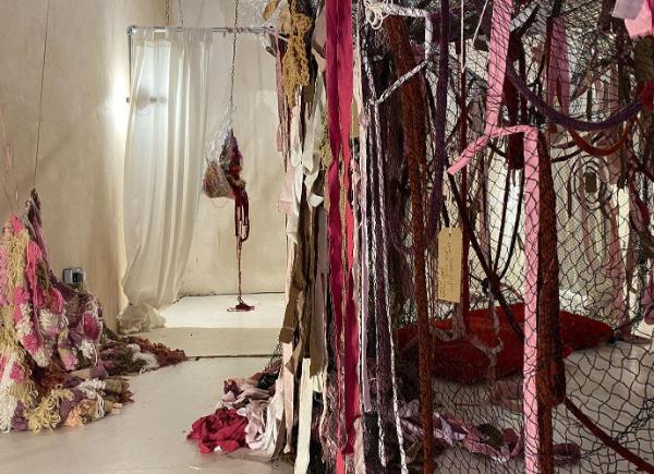 An art exhibition of hanging fabrics