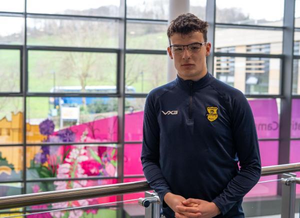 Oli Smith posing in the Commons building