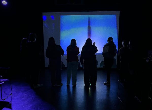A group of Drama students rehearse in a studio