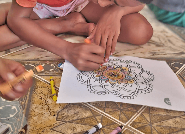 A young person drawing