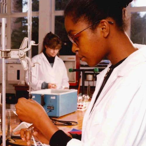Women in a lab conducting experiments 