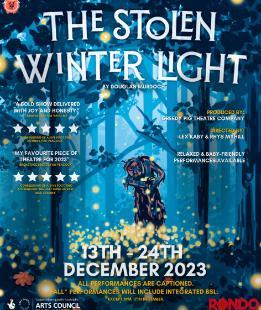 A blue poster that reads 'The Stolen Winter Light' featuring a hunched over character in a forest