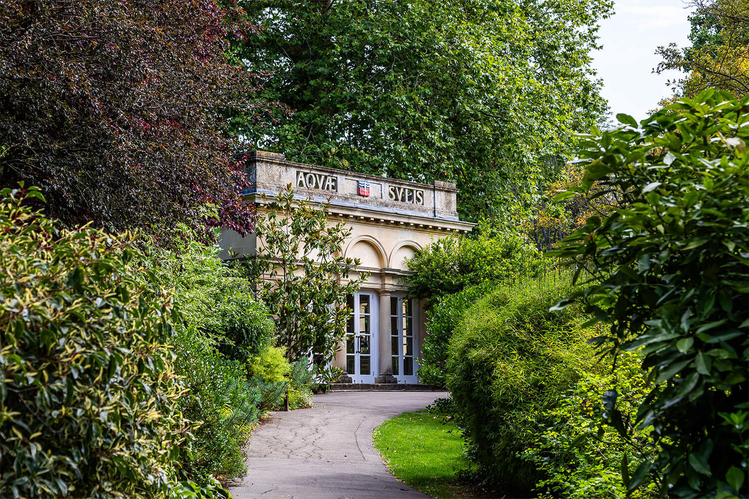 A roman temple in a park