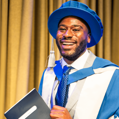 BSU honorary graduate Carl Anka dressed in graduation robes