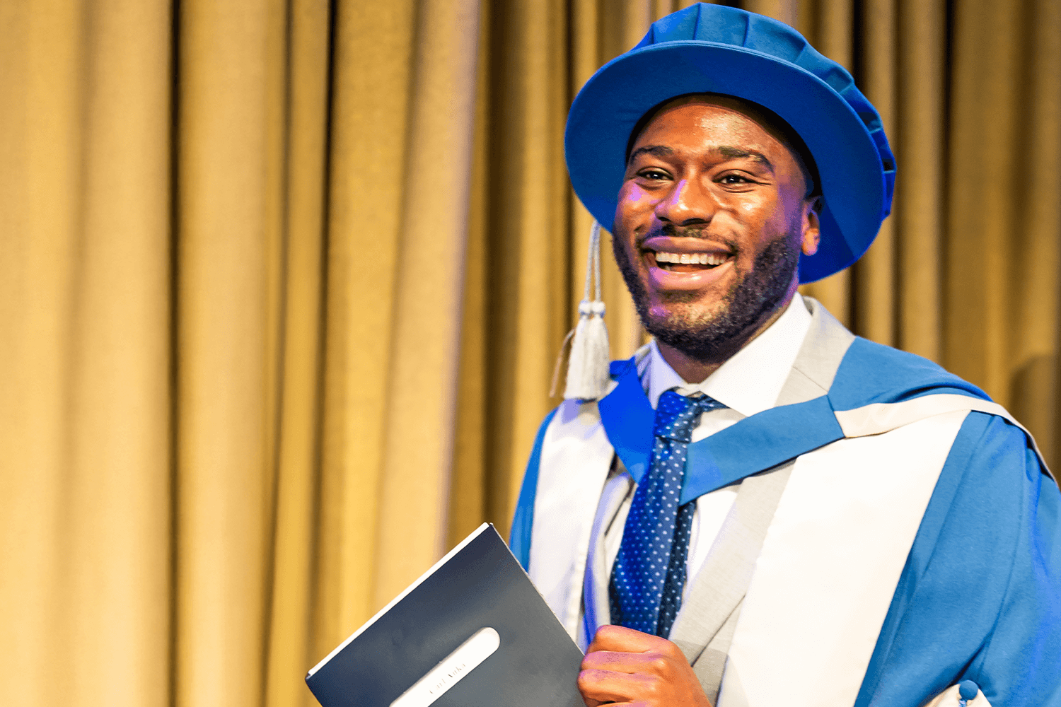 BSU honorary graduate Carl Anka dressed in graduation robes