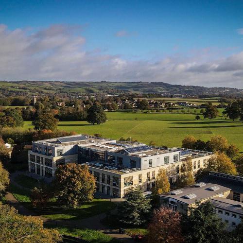 A drone image of commons building in the sun